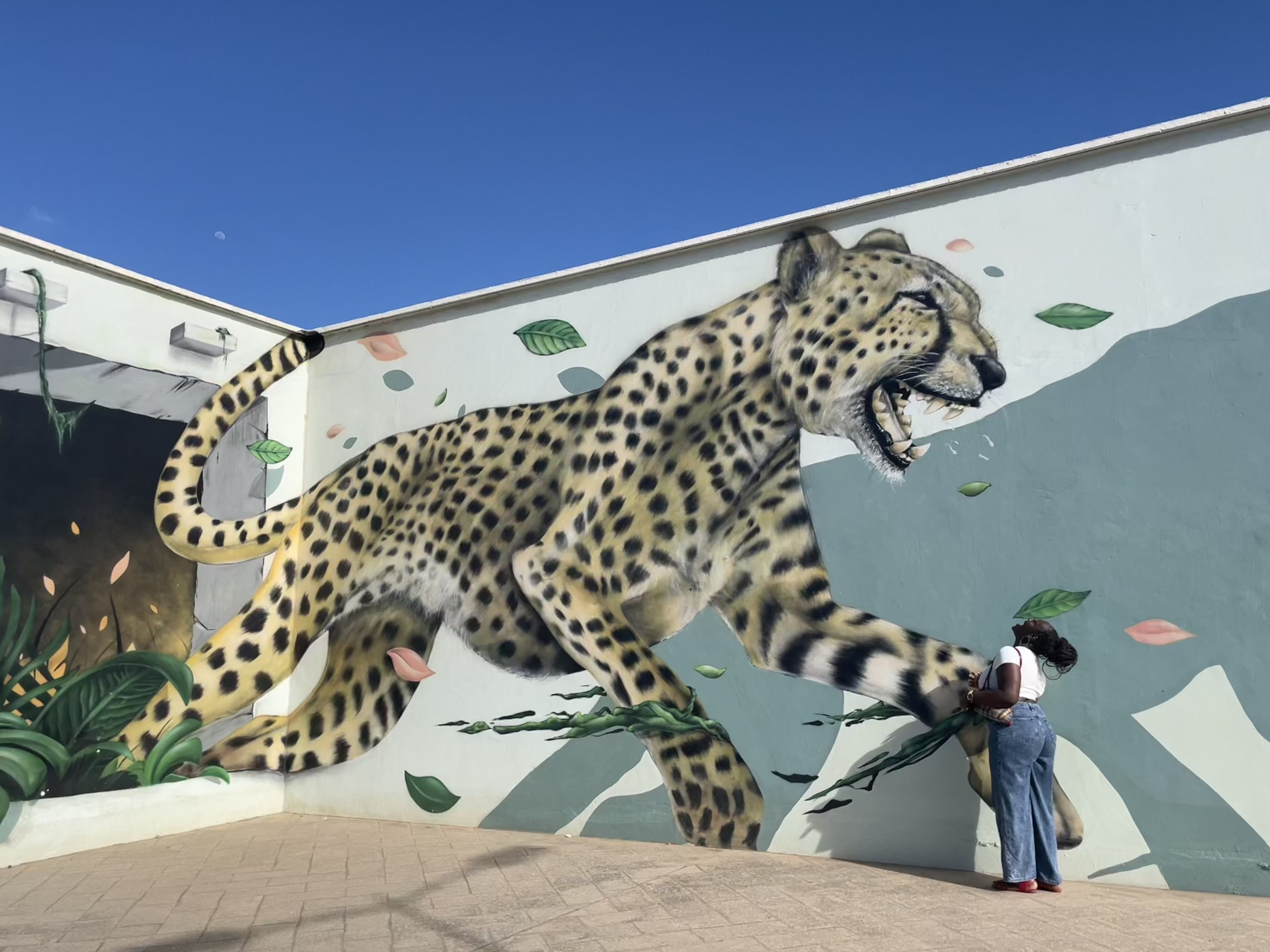 Large leopard mural photographed in Lomé
